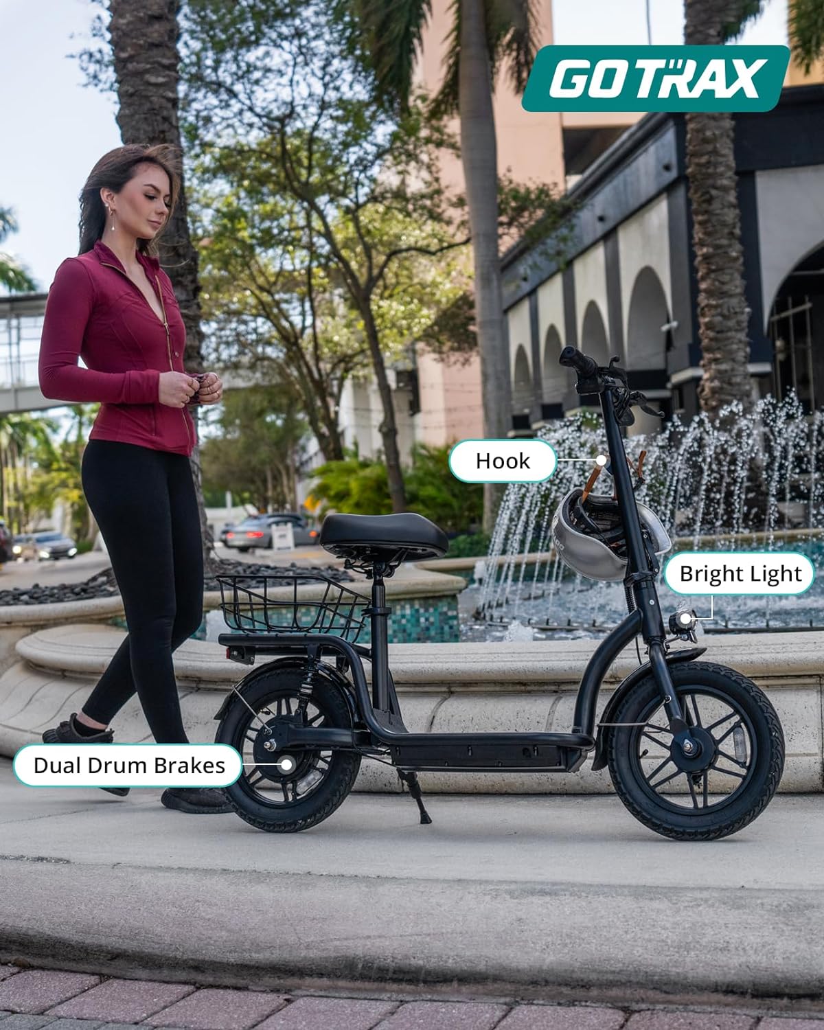 Gotrax adult electric scooter with seat, maximum range of 19-25 miles, all-terrain tires, wide pedals, padded seat, and carrycot